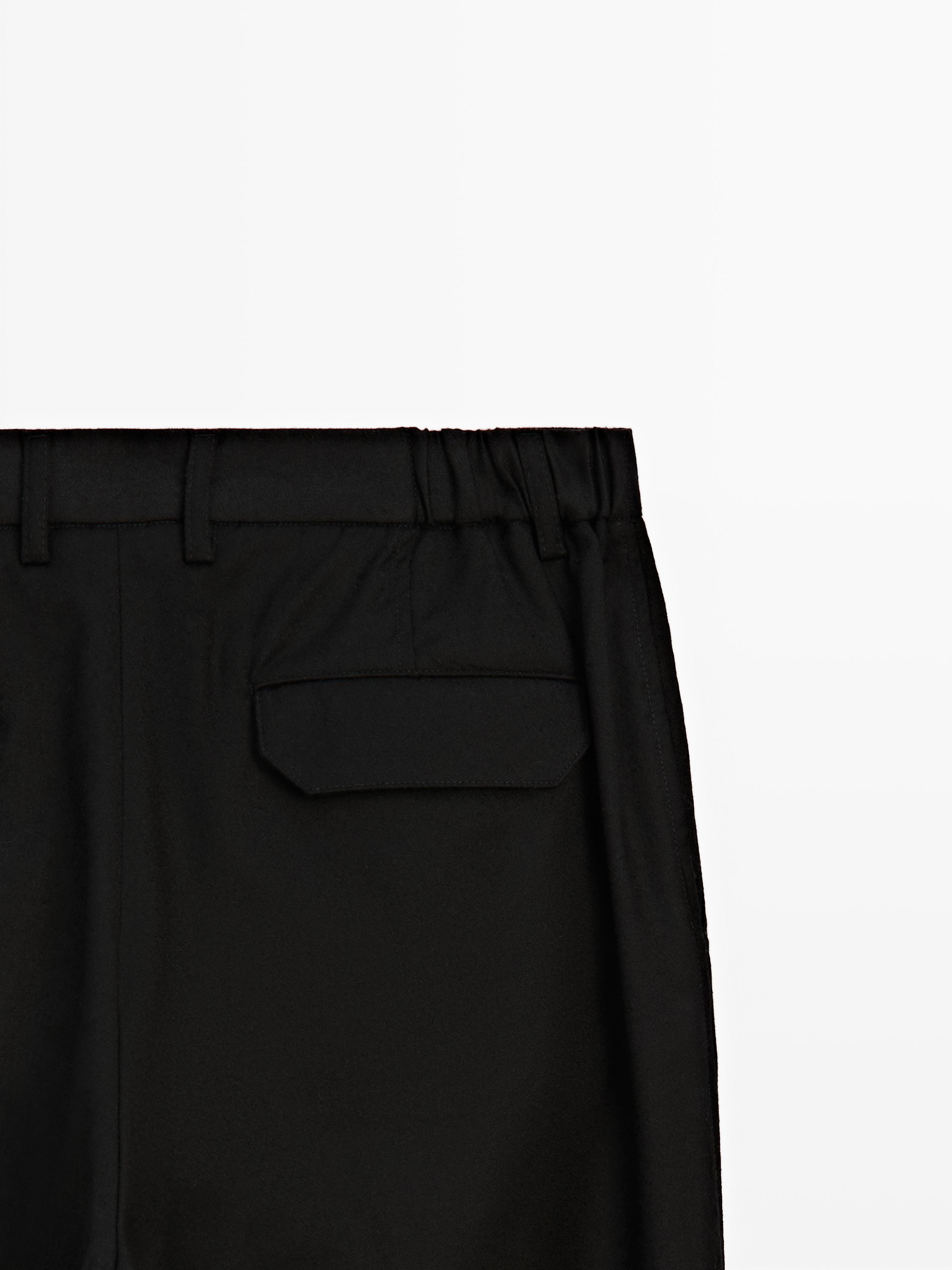 Pantalon à pinces relaxed fit en laine mélangée